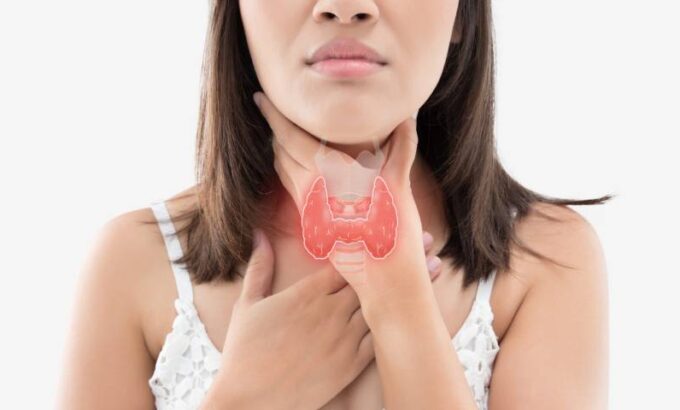 Thyroid Problems – Symptoms, Diagnosis & Treatment Options Doctor explaining thyroid problems and treatment to a patient | Thyroid Disease Treatment in Thrissur